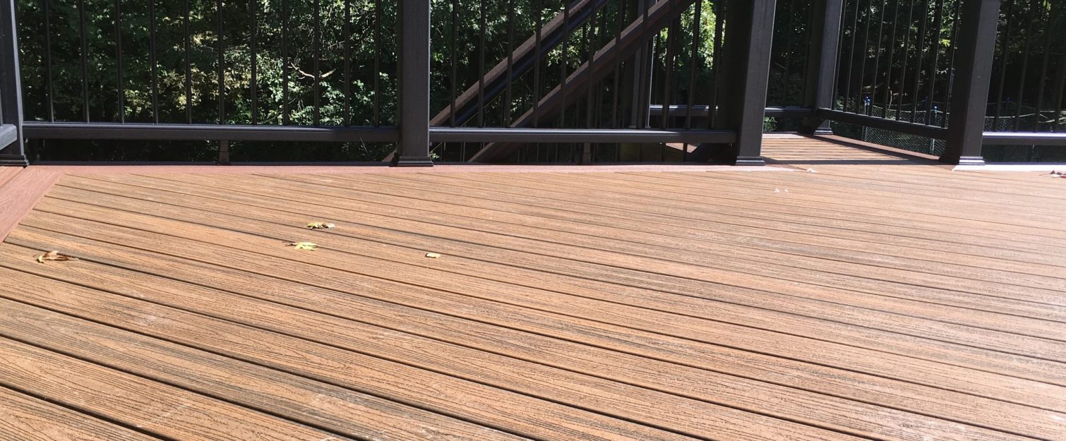 Synthetic brown decking with a black railing