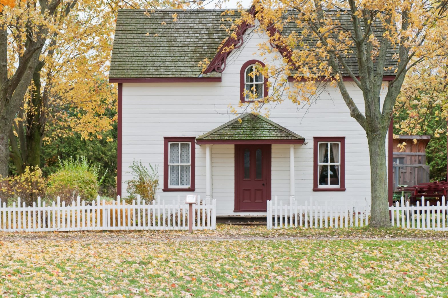 Quaint home among fall foliage