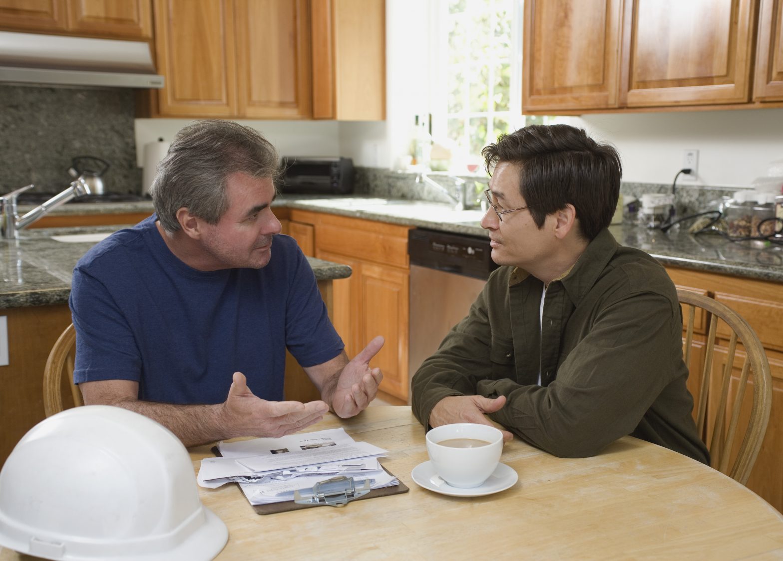 contractor meeting with a homeowner