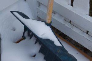 snow shovel on a deck