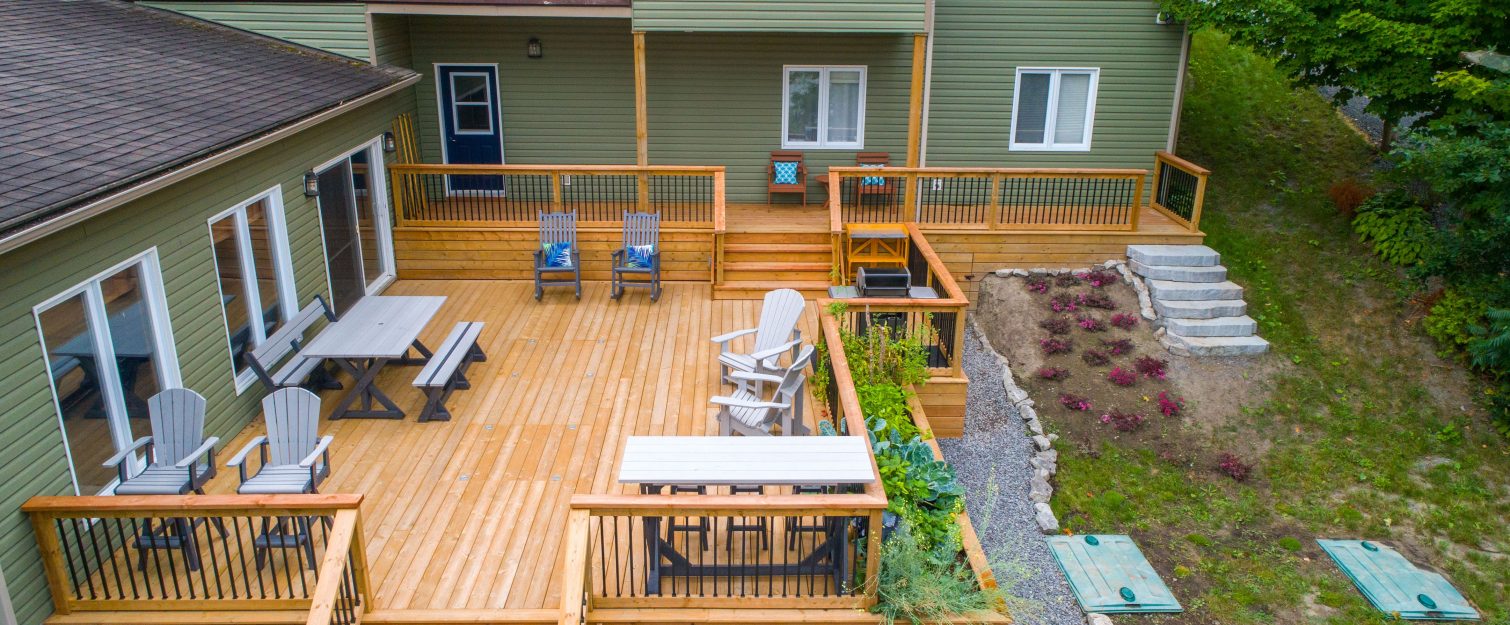 Large deck attached to back of house