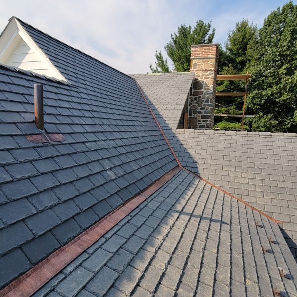 Residential home roof with new DaVinci synthetic slate roofing.