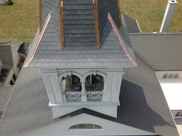 Church roof project with DaVinci synthetic slate roofing and copper capping.